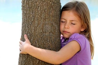 6808556-cute-young-girl-hugging-a-tree-trunk.jpg
