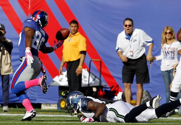New-York-Giants-Victor-Cruz-makes-a-one-handed-catch-for-a-68-yard-touchdown-at-MetLife-Stadium-.jpg