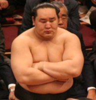 sumo wrestler waits to check his email_.jpeg